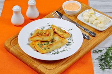 mozzarella and ham stuffed crepes wraps