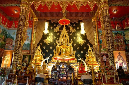 Golden buddha statue in main hall of  Wat Nimit Vipassana, temple at dan sai, Loei province, Thailand