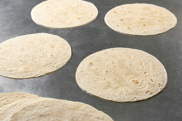Unleavened tortillas on kitchen table