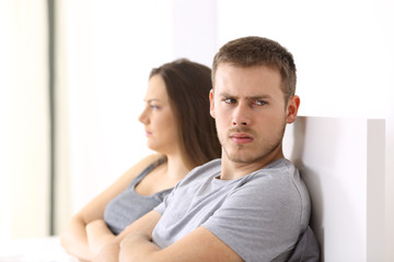 Fototapeta premium Angry couple after argument on the bed