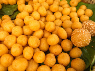 Khanom kai nok krata or sweet potato balls.