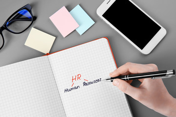Female hand writing text in notebook. Management concept © Africa Studio