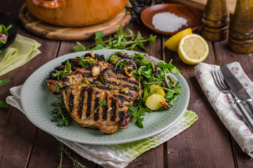 Grilled pork chops with lettuce salad