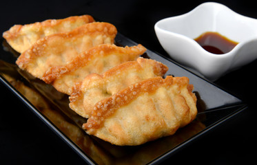 Deep fried gyoza crispy and golden colour.