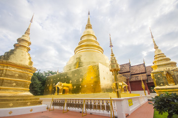 Fototapeta premium Golden pagodas at Wat Phra Singh Temple, Chiang Mai
