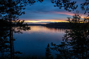 Sunset on Lake Ladoga in the Forest, St. Petersburg, Leningrad Region, Republic of Karelia, Russia
