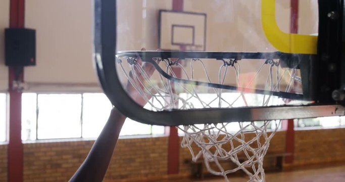 Basketball player playing in the court