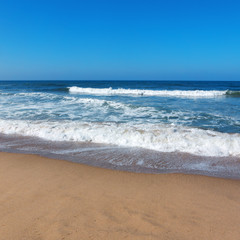 Fototapeta na wymiar California beaches near Los Angeles city with a clear blue sky and yellow sand on the coast