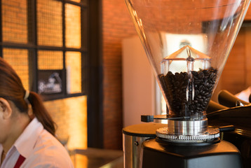 coffee grinder, coffee beans in cafe