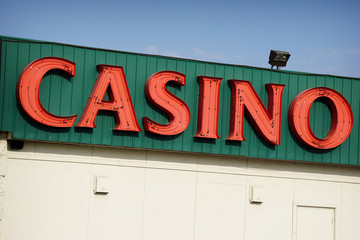 aged and worn vintage photo of neon casino sign