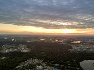 Aerial view on Moscow cityscape at sunset light. Wide angle shot from west to east side.