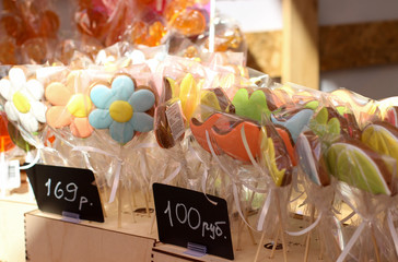 candy on a stick, selling gingerbread, colorful sweets