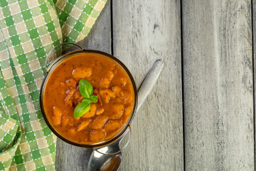 Stewed beans in tomato sauce.