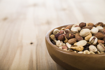 Nuts in a wooden bowl