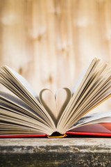 Open book on a wooden table
