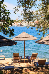 Beach umbrellas in Saint Nicholas island, Porec