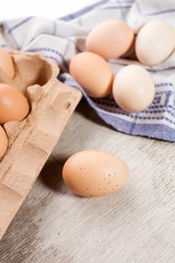 chicken eggs on dishtowels