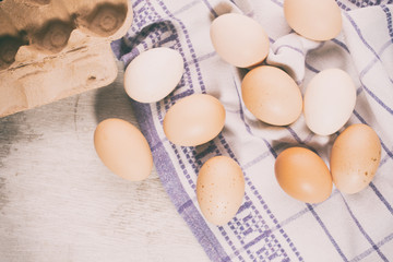 chicken eggs on dishtowels