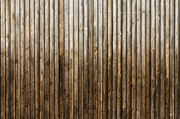 Natural brown barn wood wall. Wooden textured background pattern.