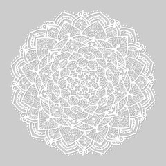 White round mandala of lines on grey background