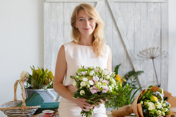 Obraz na płótnie Canvas Image of blonde with bouquet