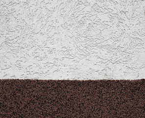 Stucco white and brown wall background or texture