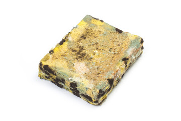 Moldy bread on white background