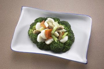 Sauteed vegetables scallops