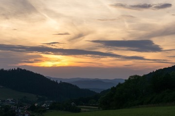 Sunrise and sunset over the hills and town. Slovakia