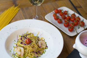 Aglio e olio (spaghetti with oil and garlic) with shrimps and strawberry soup with mascarpone