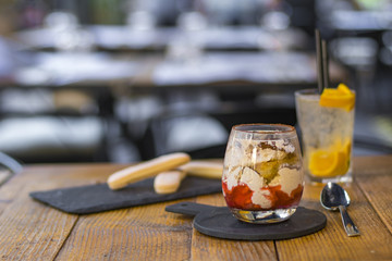 One serving of strawberry tiramisu in an italian restaurant