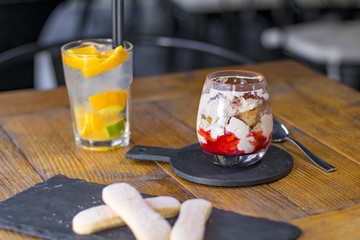 One serving of strawberry tiramisu in an italian restaurant