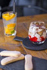 One serving of strawberry tiramisu in an italian restaurant