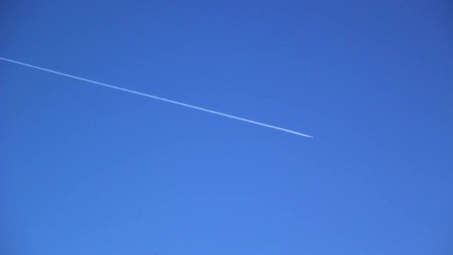 Lane from an airplane in a clear blue sky
