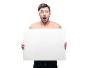 shocked young handsome man with blank banner, isolated on white