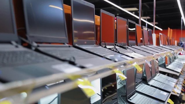 selling laptops in electronics store