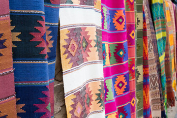 Colorful southwestern blankets hanging