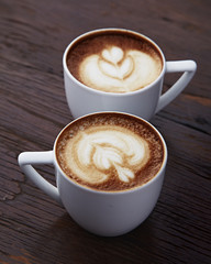 Two white cups of coffee