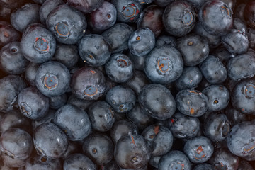 Close-up view of a pile of blueberries. Studio photography.