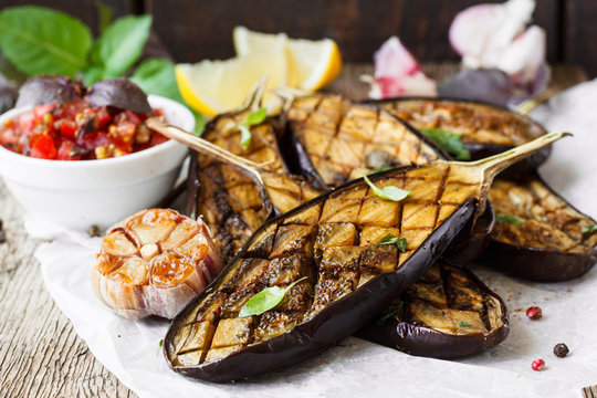 Baked eggplant on a wooden background
