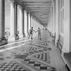 Two roller scaters in the Royal Galleries of Ostend, Belgium..