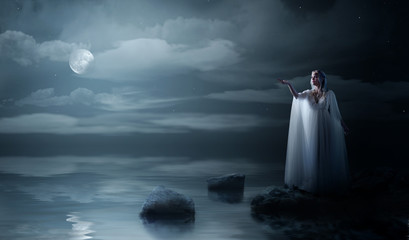 Young elven girl on sea coast