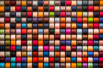 Colorful thread rolls background
