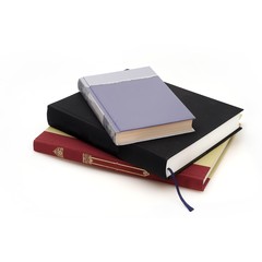 Stack of books on white background