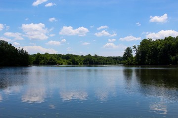 Fototapeta na wymiar The big wide lake on a bright sunny day.