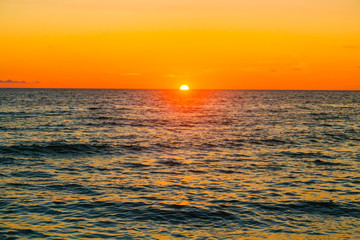 Sun setting over ocean (Gulf of Mexico - West Coast of Florida Near Clearwater and Howard Beach)