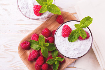 Raspberries chia pudding and fruit smoothie with mint