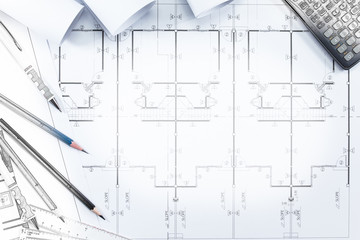 Abstract engineering drawings background with blank for your word. Construction plan tools with empty space on desk.
