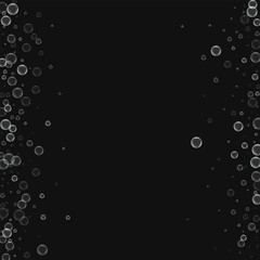 Soap bubbles. Messy border with soap bubbles on black background. Vector illustration.