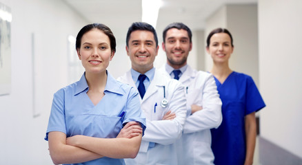Fototapeta premium group of happy medics or doctors at hospital